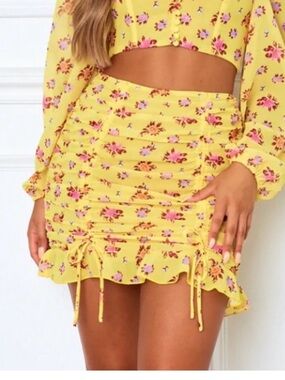 White Fox Boutique Yellow Floral Ruffle Drawstring Mini Skirt